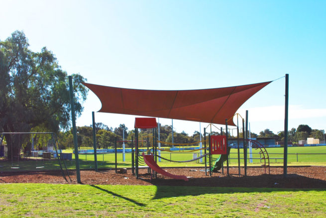 Red Shade Cloth on a Playground